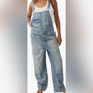 Free people distressed Denim Overalls. Size: L